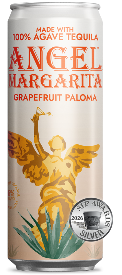 A soft pink can of Angel Margarita Grapefruit Paloma cocktail showcasing the golden Angel illustration.